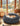 Calming Donut Dog Bed Pillow for Small Medium Pets, Machine Washable Removable Cover, Comfort Plush Fluffy Faux Fur with Anti-Slip Bottom, Cats-Friendly round Cuddly Design, Gray, 23 Inches